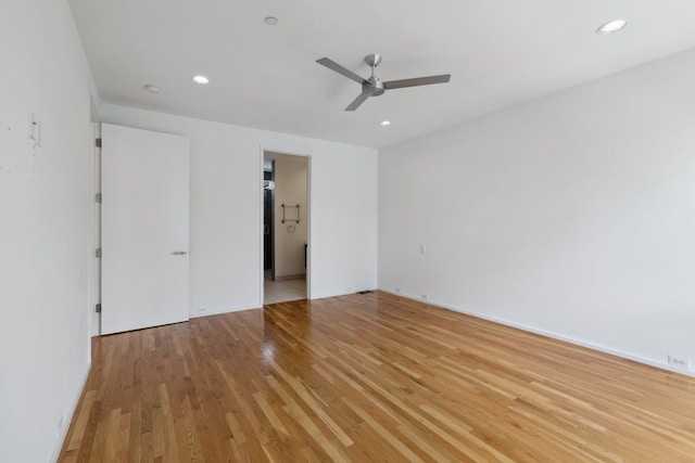 2706 Throckmorton St Unit C, Dallas, TX 75219 - unfurnished bedroom featuring light wood-style floors, recessed lighting, a ceiling fan, and baseboards