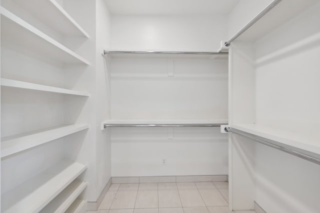 2706 Throckmorton St Unit C, Dallas, TX 75219 - spacious closet with light tile patterned flooring