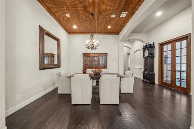 2223 Alisa Ln, Trophy Club, TX 76262 - dining area with wooden ceiling, french doors, dark wood-style floors, arched walkways, and baseboards