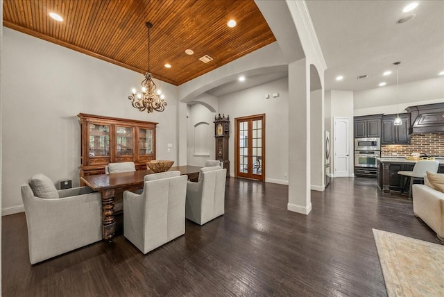2223 Alisa Ln, Trophy Club, TX 76262 - dining room with wooden ceiling, arched walkways, dark wood-type flooring, baseboards, and french doors