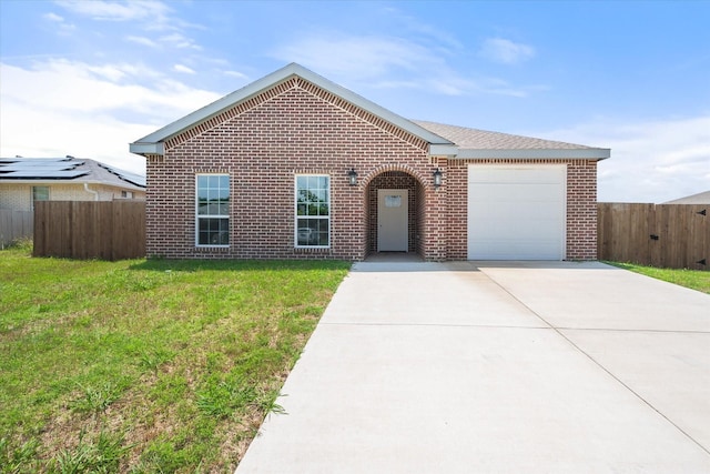 3231 Hillsdale Ave, Corsicana, TX 75110 - view of front of home with driveway, an attached garage, and brick siding