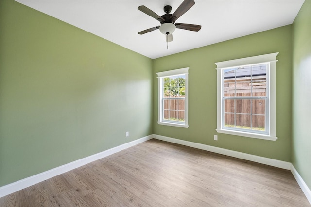 3231 Hillsdale Ave, Corsicana, TX 75110 - spare room with wood finished floors, baseboards, and ceiling fan