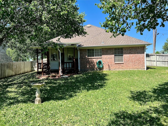 201 Park Rd, Nocona, TX 76255 - back of property with brick siding and a shingled roof