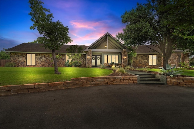 610 Sunset Ct, Argyle, TX 76226 - mid-century inspired home featuring stone siding and a front lawn