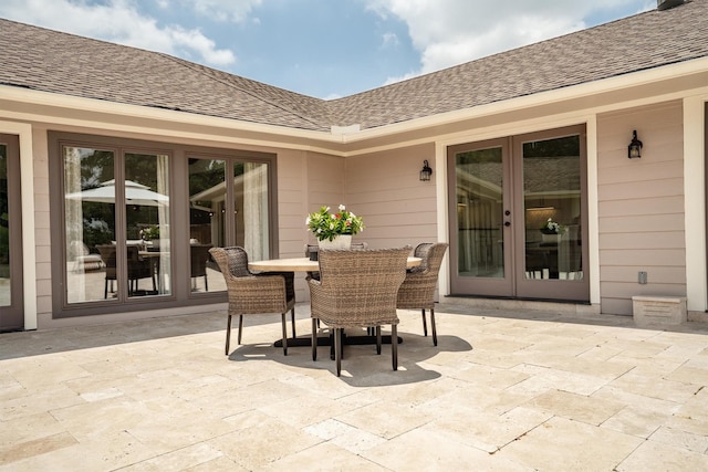 610 Sunset Ct, Argyle, TX 76226 - view of patio featuring french doors and outdoor dining area