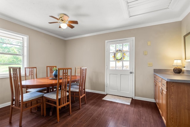 610 Sunset Ct, Argyle, TX 76226 - dining room featuring healthy amount of natural light, a ceiling fan, dark wood-style flooring, baseboards, and crown molding
