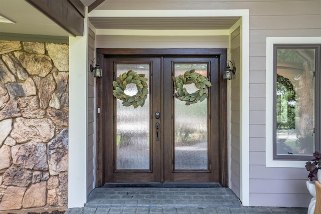 610 Sunset Ct, Argyle, TX 76226 - entrance to property with french doors and stone siding