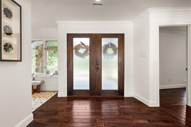610 Sunset Ct, Argyle, TX 76226 - foyer entrance with dark wood-type flooring, french doors, baseboards, and crown molding