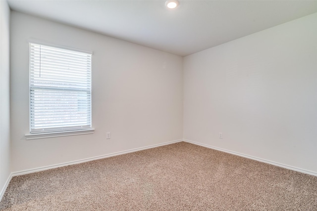 1302 Lowhill Dr, Royse City, TX 75189 - empty room with carpet floors and baseboards