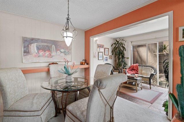 408 Hollyhill Ln, Denton, TX 76205 - tiled dining area with a textured ceiling