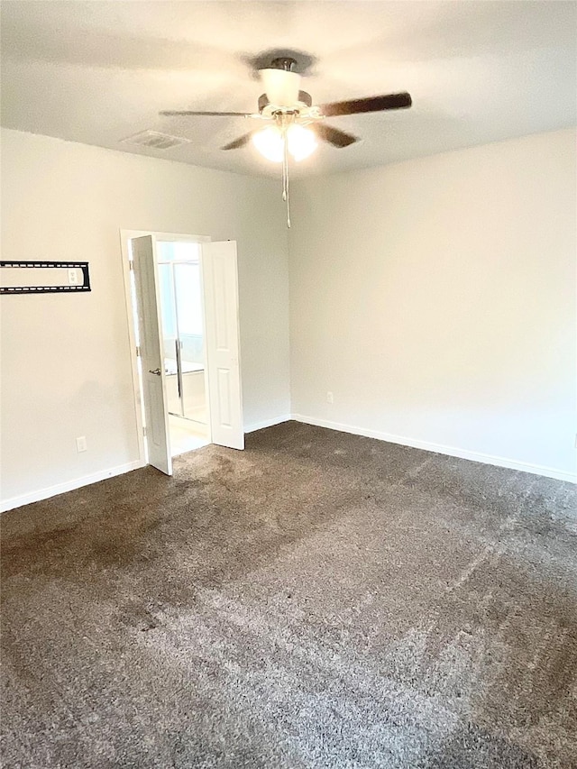 2518 Lavender Ln, Glenn Heights, TX 75154 - spare room with ceiling fan, carpet flooring, and baseboards