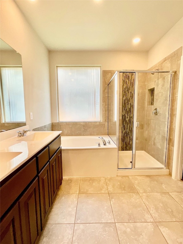 2518 Lavender Ln, Glenn Heights, TX 75154 - full bath with a garden tub, tile patterned flooring, double vanity, and a stall shower