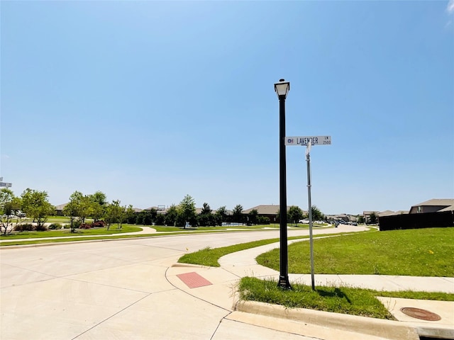 2518 Lavender Ln, Glenn Heights, TX 75154 - view of community featuring a lawn