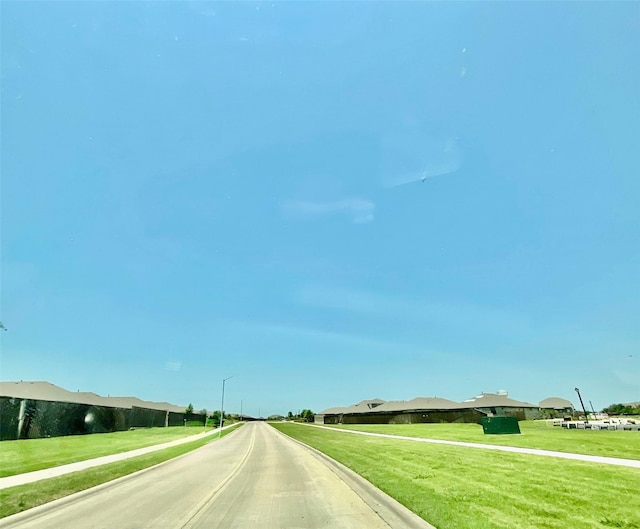 2518 Lavender Ln, Glenn Heights, TX 75154 - view of street featuring street lights and sidewalks