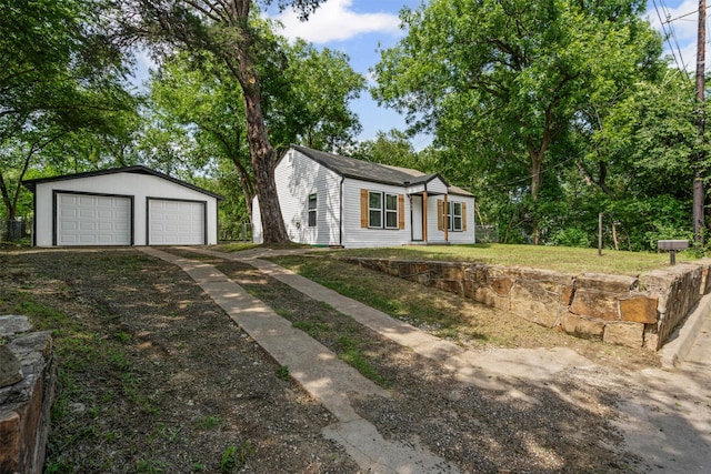 307 Soward Ave, Weatherford, TX 76086 - ranch-style home with a garage, an outdoor structure, and a front lawn