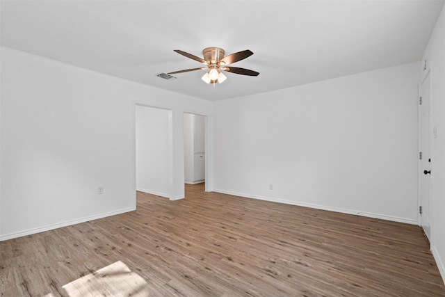 307 Soward Ave, Weatherford, TX 76086 - empty room featuring ceiling fan, wood finished floors, and baseboards