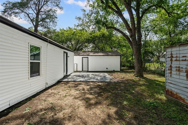 307 Soward Ave, Weatherford, TX 76086 - view of yard with a patio and an outbuilding
