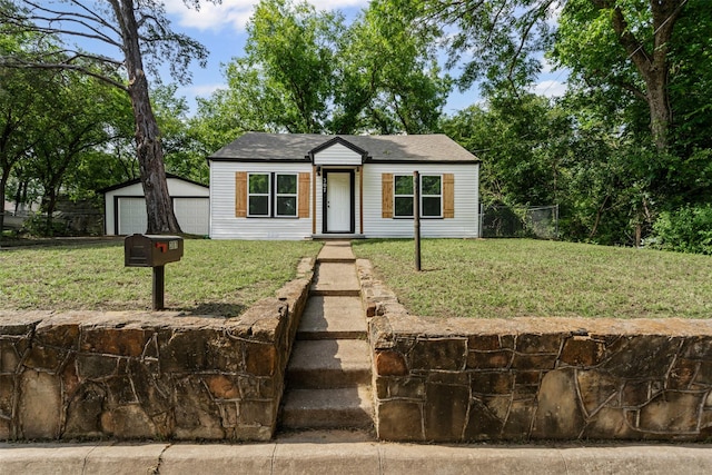 307 Soward Ave, Weatherford, TX 76086 - ranch-style house with a garage and an outdoor structure