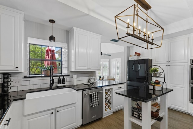 3512 Ridglea Country Club Dr, Fort Worth, TX 76116 - kitchen with appliances with stainless steel finishes, a sink, dark countertops, and decorative backsplash