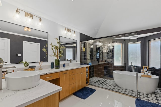 3512 Ridglea Country Club Dr, Fort Worth, TX 76116 - full bathroom featuring double vanity, a freestanding bath, vaulted ceiling, a shower stall, and tile patterned flooring