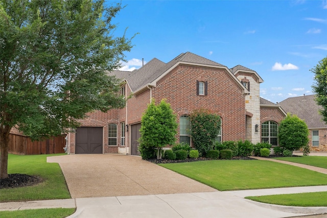 2820 Annandale Dr, Trophy Club, TX 76262 - view of front facade with brick siding and driveway