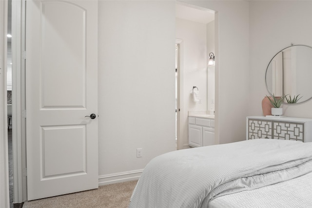 2820 Annandale Dr, Trophy Club, TX 76262 - bedroom featuring light colored carpet, baseboards, and ensuite bathroom