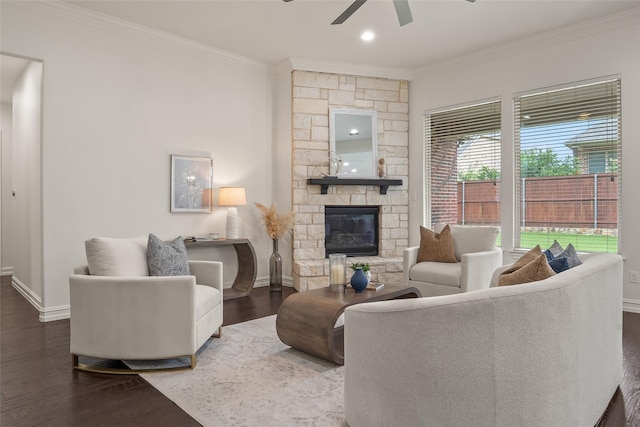 2820 Annandale Dr, Trophy Club, TX 76262 - living area with ornamental molding, a ceiling fan, dark wood-style floors, baseboards, and a fireplace