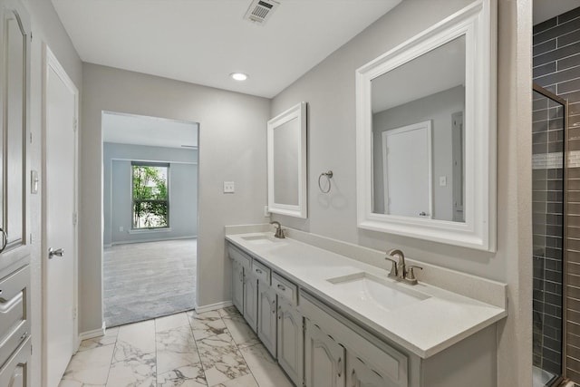 4448 Atlanta Dr, Plano, TX 75093 - bathroom with marble look tile flooring, double vanity, baseboards, and recessed lighting