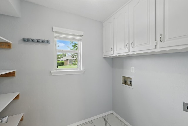 4448 Atlanta Dr, Plano, TX 75093 - laundry room with cabinet space, marble finish flooring, baseboards, hookup for a washing machine, and hookup for an electric dryer