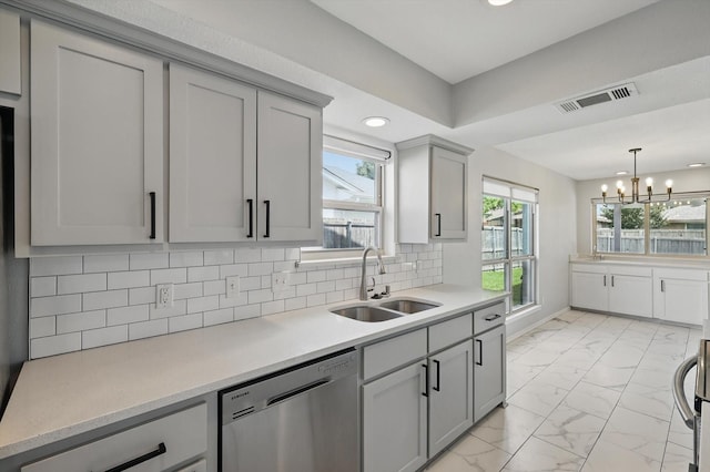 4448 Atlanta Dr, Plano, TX 75093 - kitchen featuring dishwasher, a sink, light marble finish floors, recessed lighting, and gray cabinets