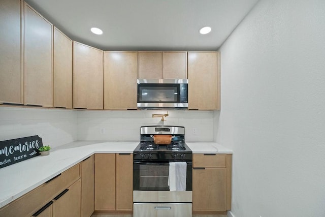 4709 Albermarle Dr, Fort Worth, TX 76132 - kitchen with appliances with stainless steel finishes, backsplash, light brown cabinets, and recessed lighting