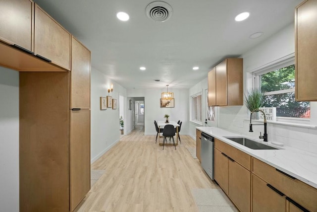 4709 Albermarle Dr, Fort Worth, TX 76132 - kitchen with a sink, stainless steel dishwasher, light wood-style floors, recessed lighting, and a chandelier