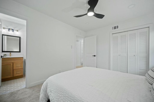 4709 Albermarle Dr, Fort Worth, TX 76132 - bedroom featuring a closet, baseboards, light carpet, ceiling fan, and ensuite bath