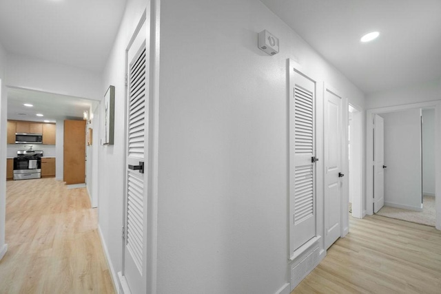 4709 Albermarle Dr, Fort Worth, TX 76132 - hall with light wood-style floors, baseboards, and recessed lighting