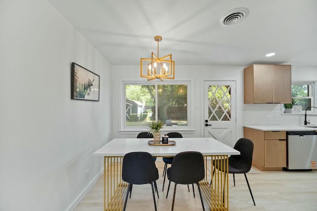 4709 Albermarle Dr, Fort Worth, TX 76132 - dining space featuring a chandelier, light wood-style floors, baseboards, and recessed lighting