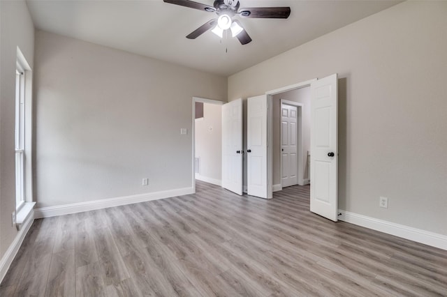 829 Foxridge Dr, Arlington, TX 76017 - unfurnished bedroom with light wood-type flooring, baseboards, and ceiling fan