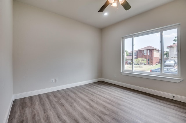 829 Foxridge Dr, Arlington, TX 76017 - empty room featuring wood finished floors, ceiling fan, baseboards, and recessed lighting