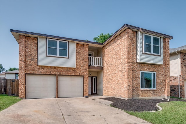 829 Foxridge Dr, Arlington, TX 76017 - view of front of home featuring a balcony, driveway, a garage, and brick siding