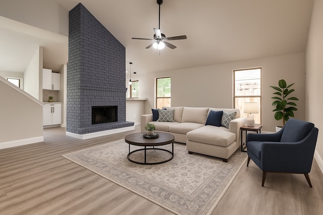 829 Foxridge Dr, Arlington, TX 76017 - living area featuring light wood-style flooring, ceiling fan, high vaulted ceiling, a fireplace, and baseboards