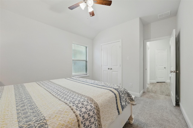 2109 Liriope Ln, Waxahachie, TX 75165 - bedroom with carpet floors, baseboards, vaulted ceiling, a ceiling fan, and a closet