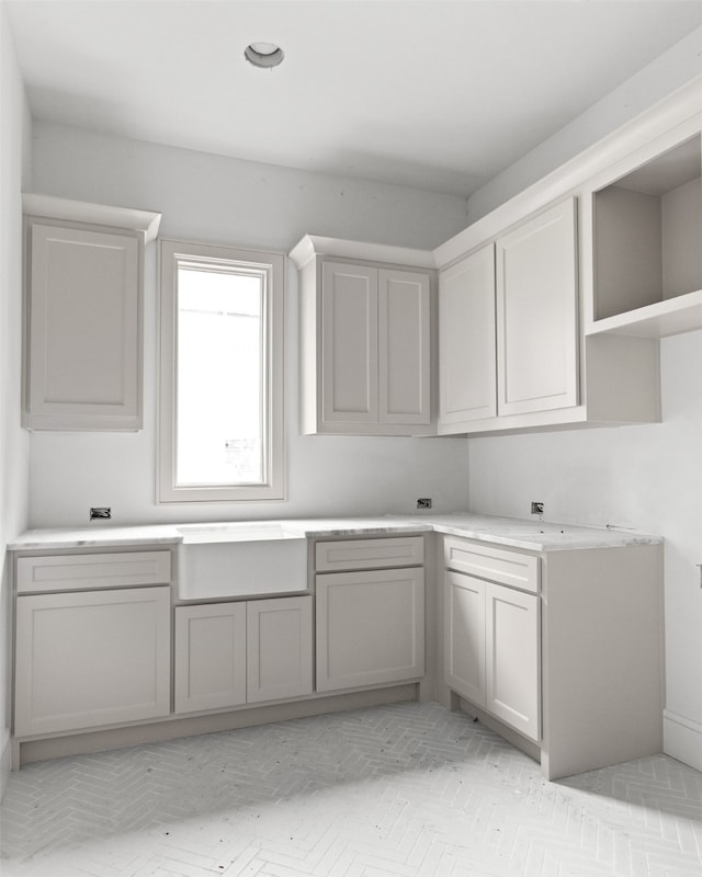 6207 Marquita Ave, Dallas, TX 75214 - kitchen with gray cabinetry