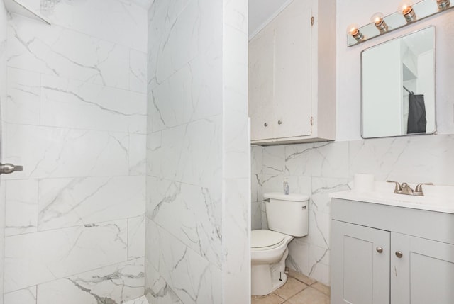 1705 Jefferson St, Commerce, TX 75428 - full bath with vanity, toilet, and tile walls