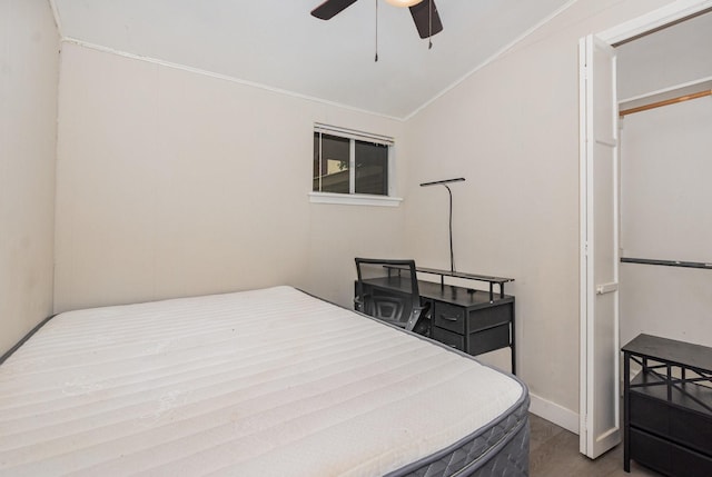 1705 Jefferson St, Commerce, TX 75428 - bedroom featuring crown molding, a ceiling fan, and baseboards