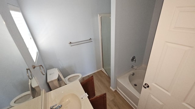 5833 Mirror Ridge Dr, Fort Worth, TX 76179 - full bath with toilet, wood finished floors, vanity, baseboards, and  shower combination