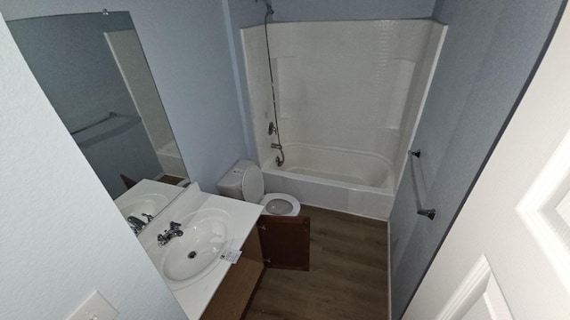 5833 Mirror Ridge Dr, Fort Worth, TX 76179 - full bath featuring wood finished floors, vanity, bathtub / shower combination, and toilet