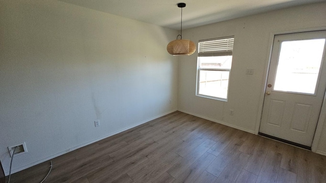 5833 Mirror Ridge Dr, Fort Worth, TX 76179 - unfurnished dining area featuring dark wood-style floors and baseboards