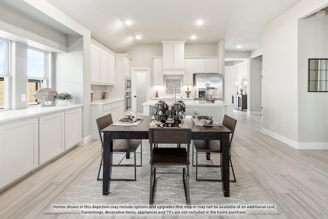 924 Split Oak Ln, Anna, TX 75409 - dining area featuring light wood-type flooring, baseboards, vaulted ceiling, and recessed lighting