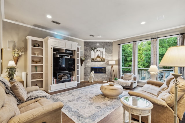 600 Loving Ct, Southlake, TX 76092 - living area featuring ornamental molding, a high end fireplace, wood finished floors, and recessed lighting