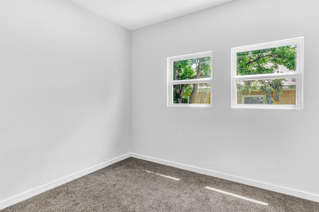 2735 Grafton Ave, Dallas, TX 75211 - spare room featuring carpet and baseboards