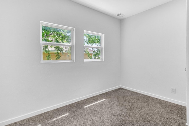 2735 Grafton Ave, Dallas, TX 75211 - unfurnished room with carpet flooring and baseboards